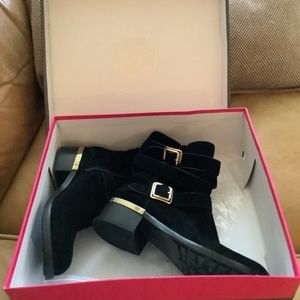 Vine Camuto Webey black bootie, gold buckle details. Brand New in original box.